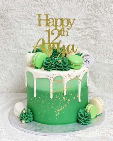 Elegant Green Cake with White Drips