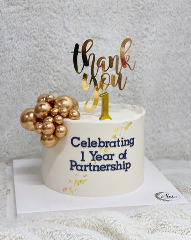 Minimalist Cake with Gold Balls