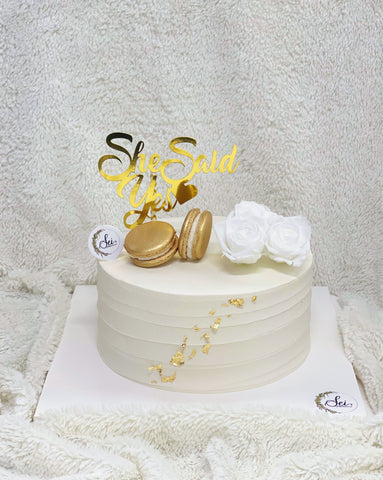 Minimalist Floral and Macaron Cake