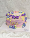 Pink and Purple Rosette Cake